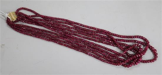 An Indian multi strand facet cut ruby necklace, 52cm.